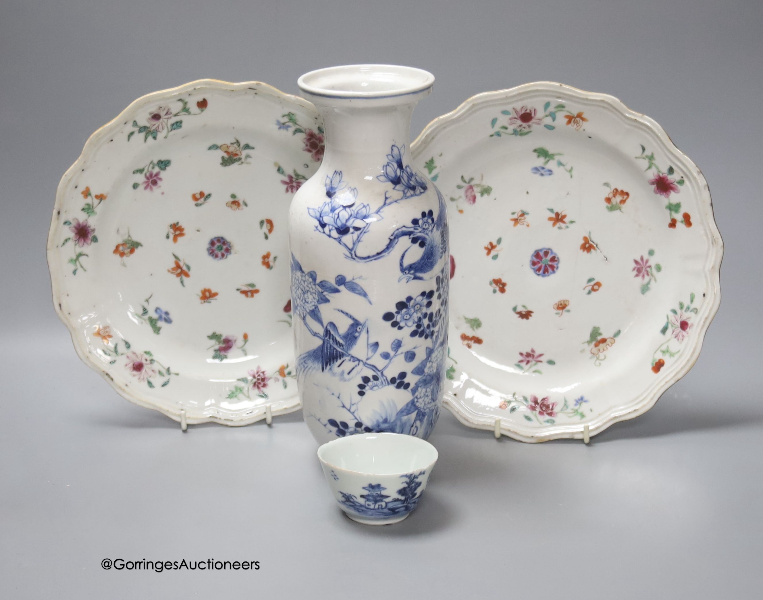 A Chinese late 19th century blue and white vase, height 25.5cm, a pair of 18th century Chinese export famille rose plates and a blue and white tea bowl